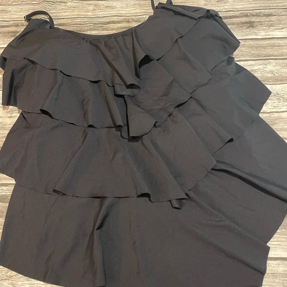 Ruffled bathing suit top.